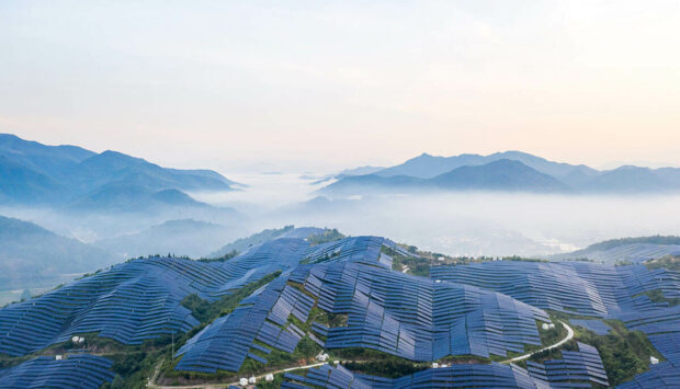 Solar panels covering the top of a mountain